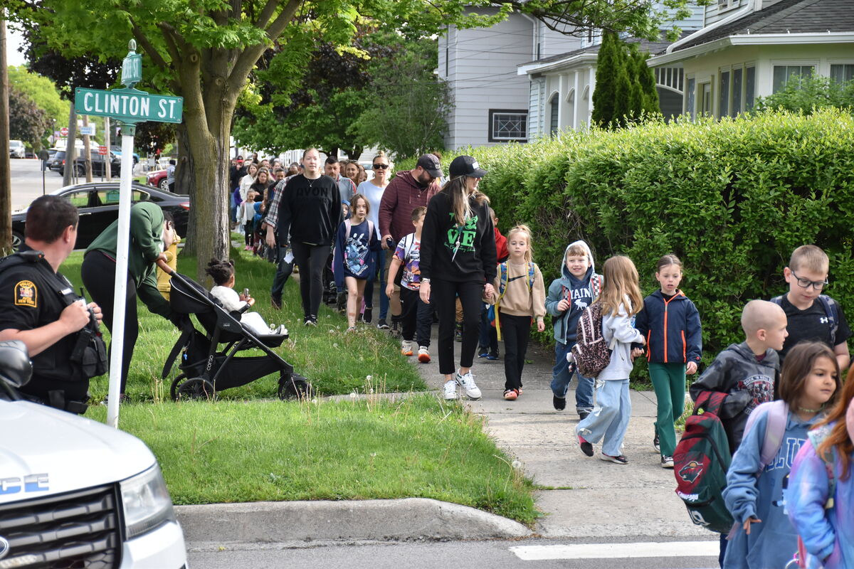 Avon Elementary families stretch their legs at annual 'Walk to School Day' 