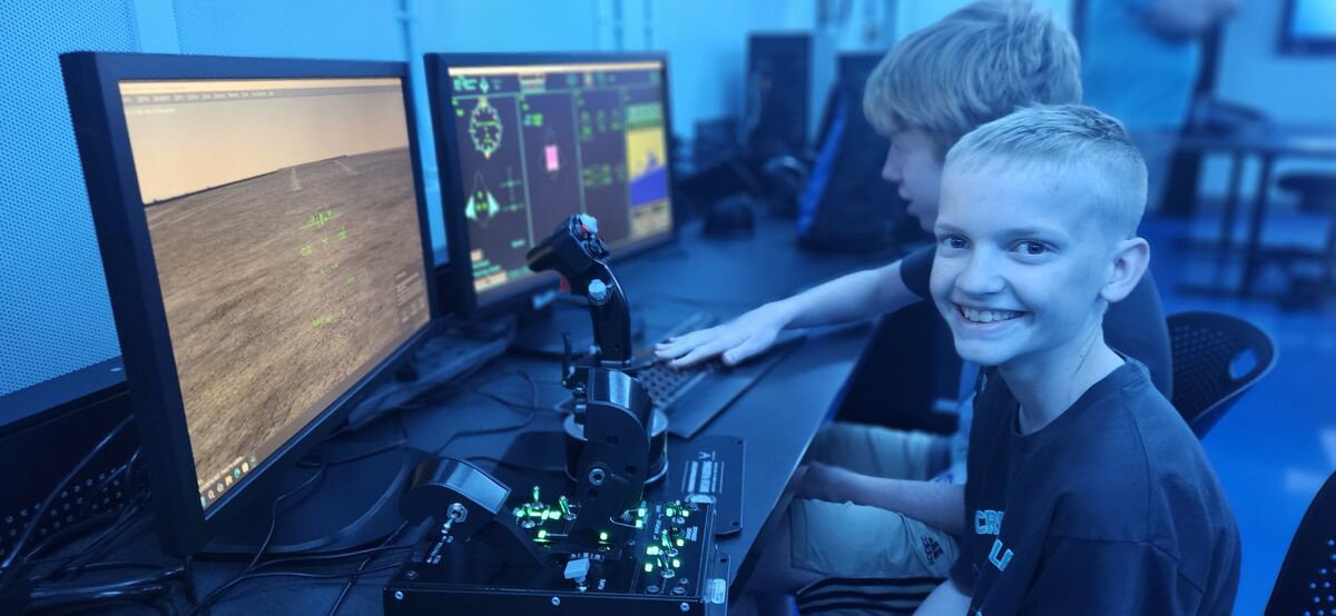 A picture of students visiting the National Flight Academy